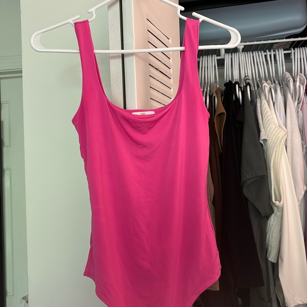 pink body suit